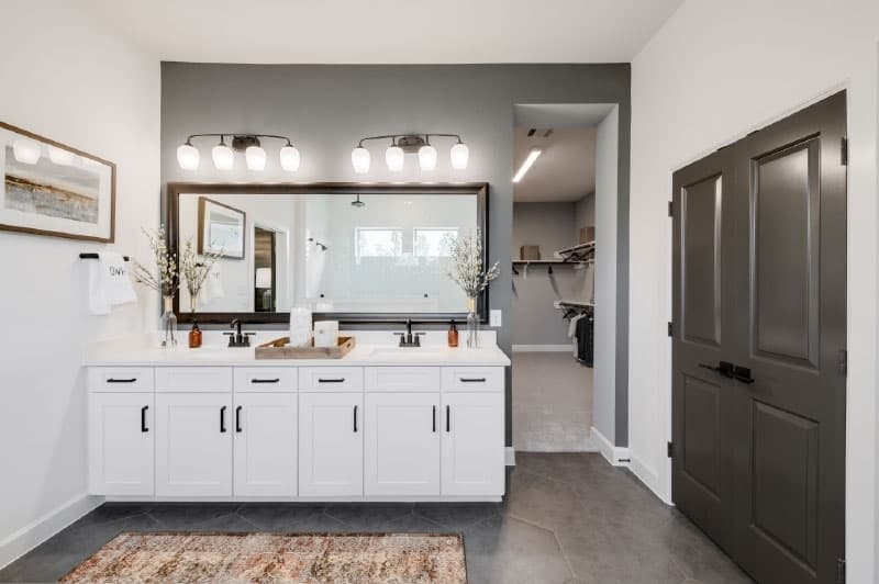 Houses include up to four bathrooms with an option for a half-bath. The wood base cabinets include a choice of multiple stains.