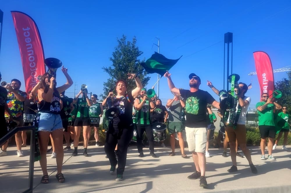La Murga de Austin pumps up the crowd at the groundbreaking for McKalla Station. (Jennifer Schaefer/Community Impact Newspaper)