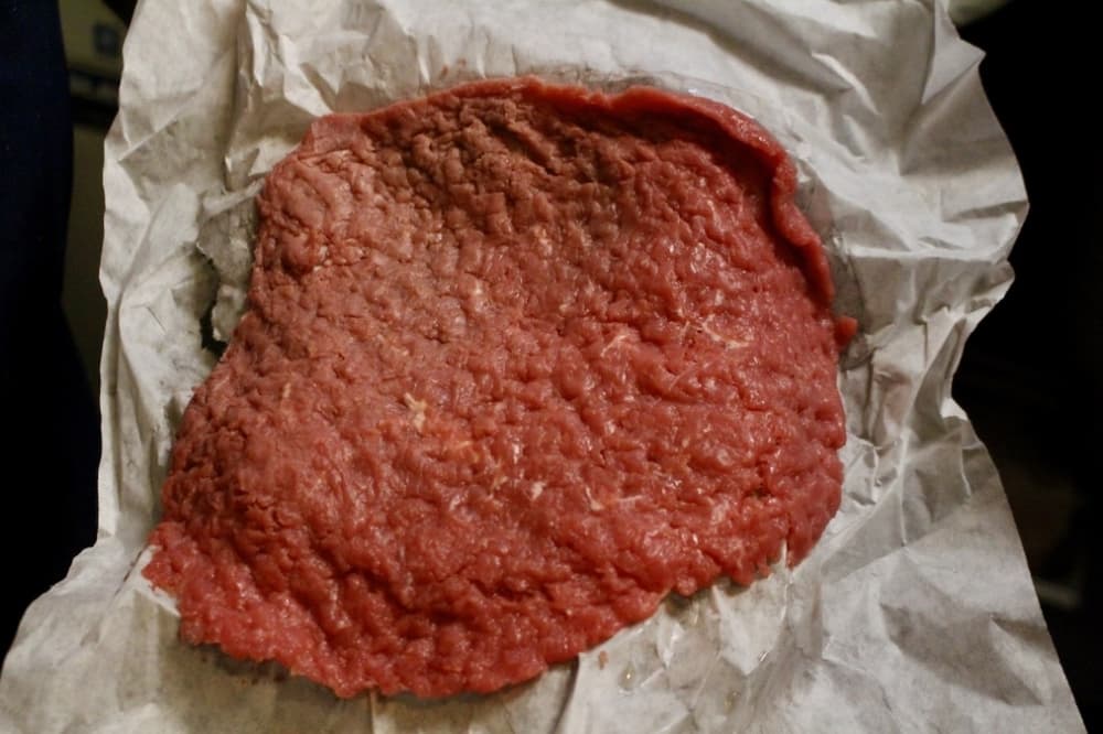 Chicken-fried steak, Bahena-Cuevas’ specialty, starts off with a thin, seasoned beef steak that is soaked in flour and eggs. (Jishnu Nair/Community Impact Newspaper)