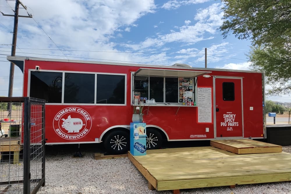 Food trailer Crimson Creek Smokehouse now located at Deep Eddy Vodka tasting room