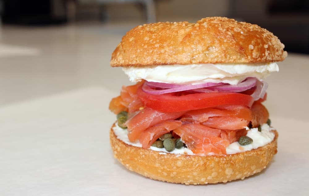 Classic nova lox from New York is paired with red onions, capers, tomatoes and plain cream cheese ($14). (Karen Chaney/Community Impact Newspaper)