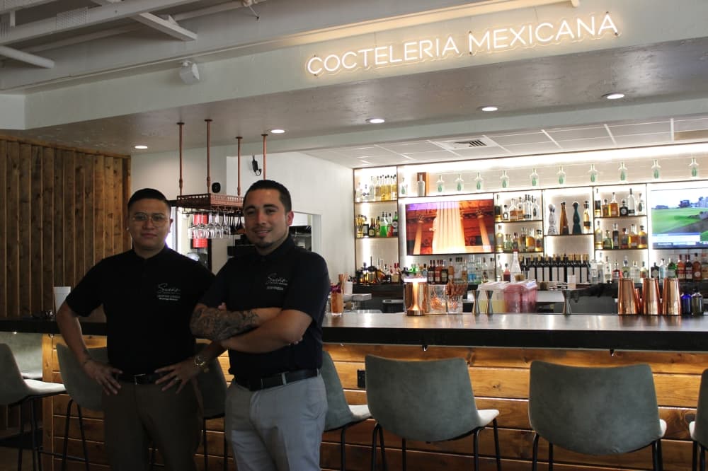 Cousins Christian Lujano (left) and Julio Pineda (right) co-own Sueño Modern Mex-Tex. (Photos by Sara Rodia/Community Impact Newspaper)
