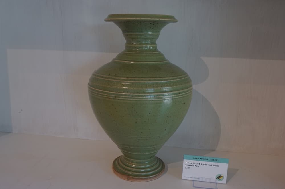 A Green-Glazed Southeast Asian Ceramic Vase at the Lark Mason Gallery is listed for retail at $325. (Sierra Martin/Community Impact Newspaper)