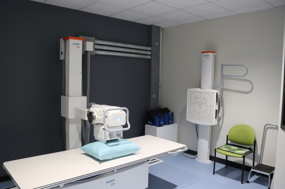 The digital X-ray machine at the clinic can be used to diagnose a variety of orthopedic conditions. (Grant Johnson/Community Impact Newspaper)