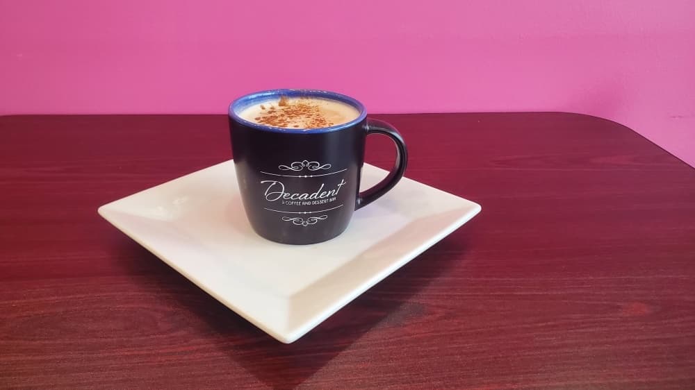 Cinnamon Yum Latte ($4.95) is made with fresh espresso. (Photo by Cynthia Zelaya/Community Impact Newspaper)