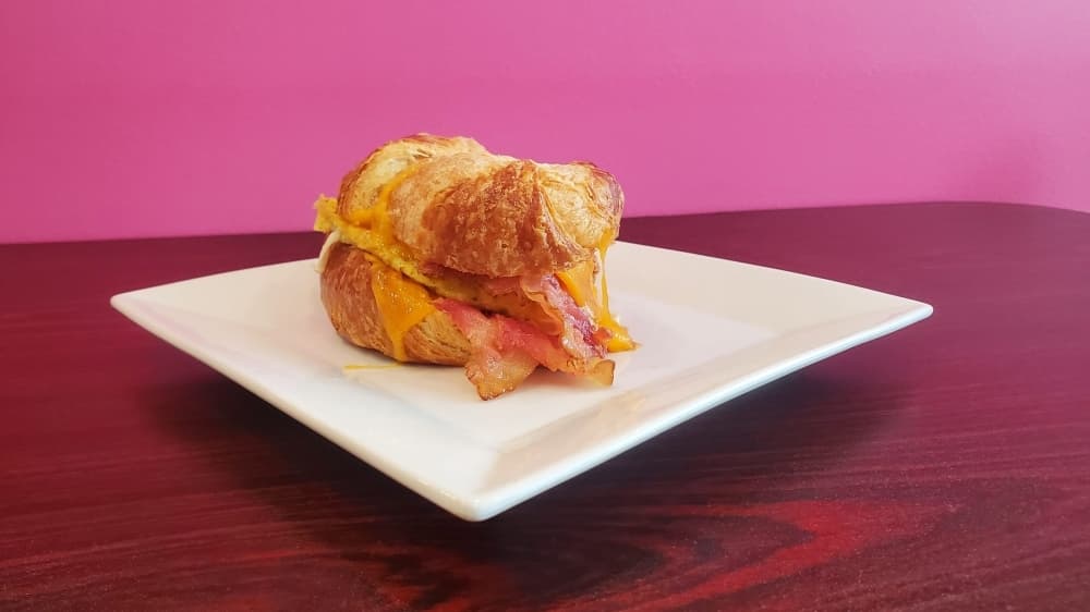 Southern Charm Breakfast Sandwich ($7.95) has eggs, bacon and cheese. (Photo by Cynthia Zelaya/Community Impact Newspaper)