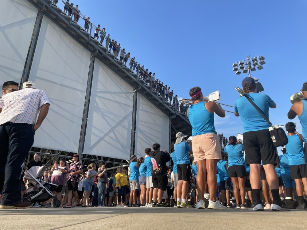 The band and cheer team from Pearland and Dawson high schools were present for the Pearland Little League’s sendoff. (Andy Yanez/Community Impact Newspaper)