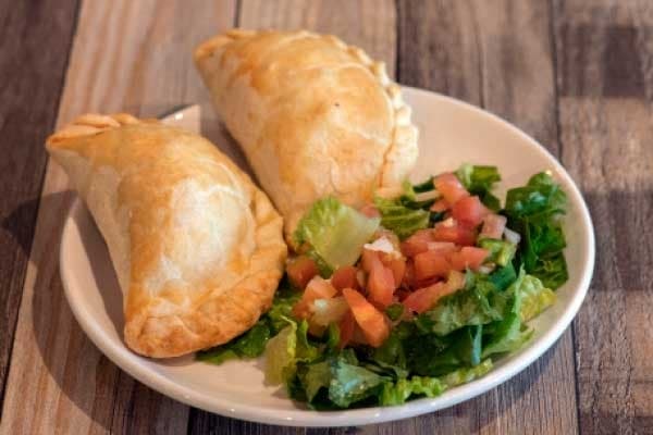 Kokomo’s offers chicken empanadas with queso dip ($8.95) as well as sweet options. (Photos courtesy Belinda Sipp)