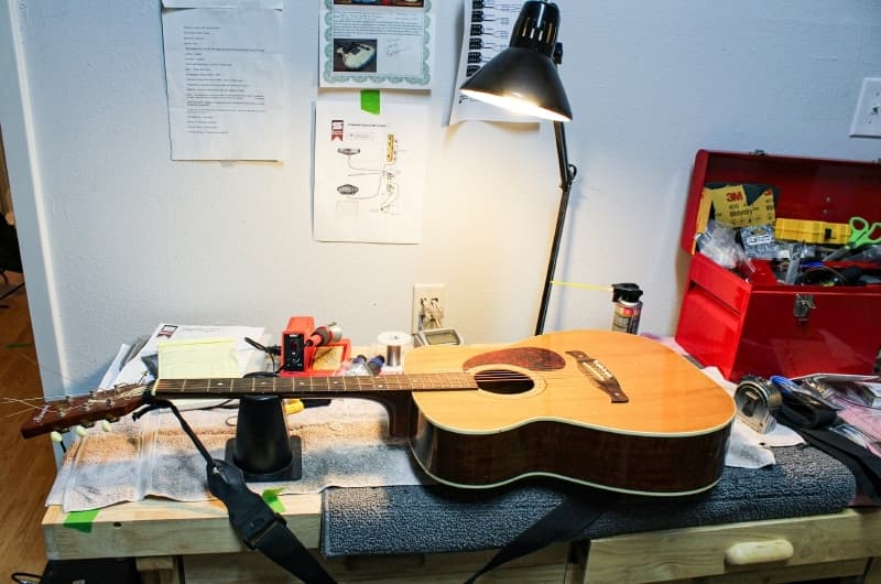 Guitar setup—applying new strings and tuning—is one of the services offered. 