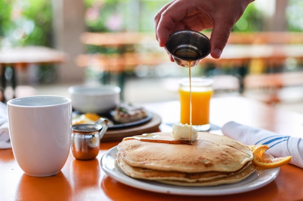 Krause's Cafe's Pancakes come with two slices of bacon or one sausage patty. $5 (Krause's Cafe/Community Impact Newspaper)
