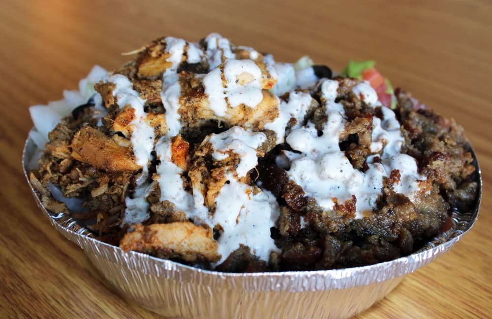 The combo gyro platter ($10.99) is served with rice and vegetables. (Karen Chaney/Community Impact Newspaper)
