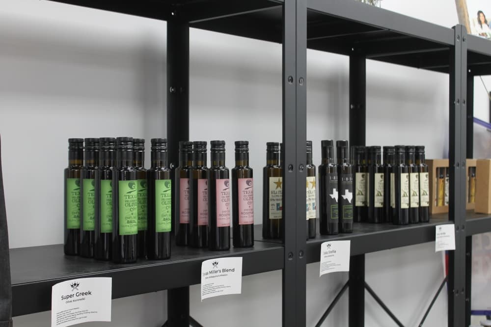 Royalty Meat Company also sells products from other small businesses, such as oils. (Renee Farmer/Community Impact Newspaper)