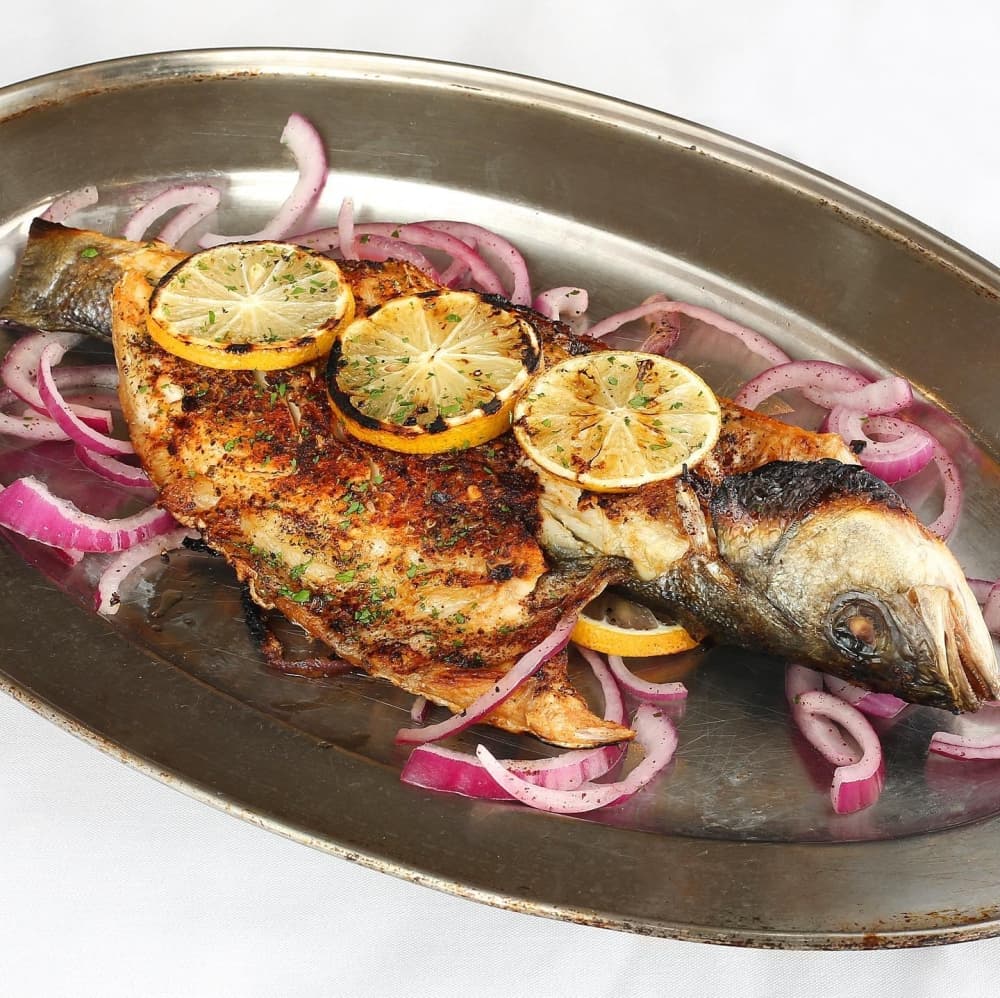 Branzino di Napoli is one of the chef’s specialties at Basil Mediterranean Kitchen. (Edmond Ortiz/Community Impact Newspaper)
