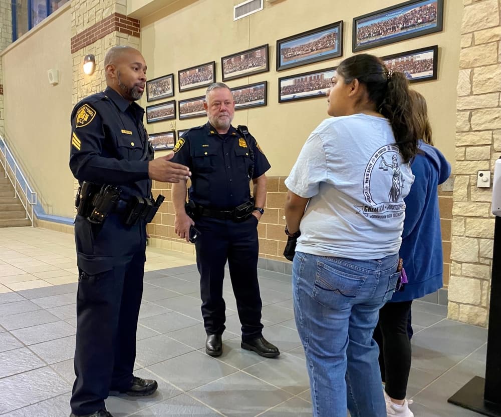 San Antonio Police Department personnel talk with Johnson High School Criminal Justice Club members. (Courtesy North East ISD)