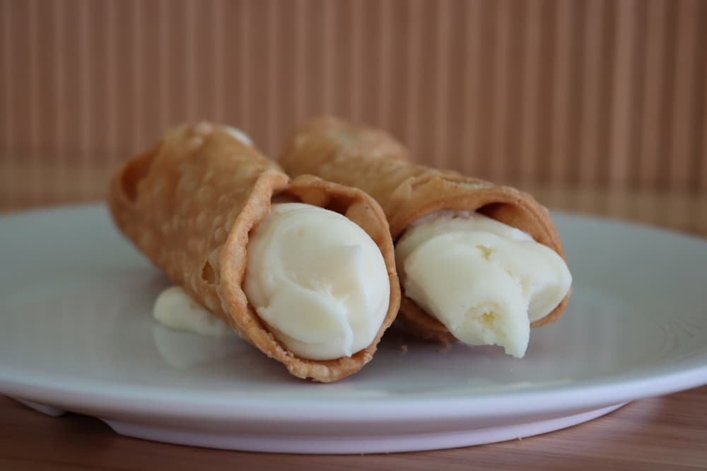 Cannoli ($2.99) features a crispy shell and creamy ricotta filling. (Grant Johnson/Community Impact Newspaper)