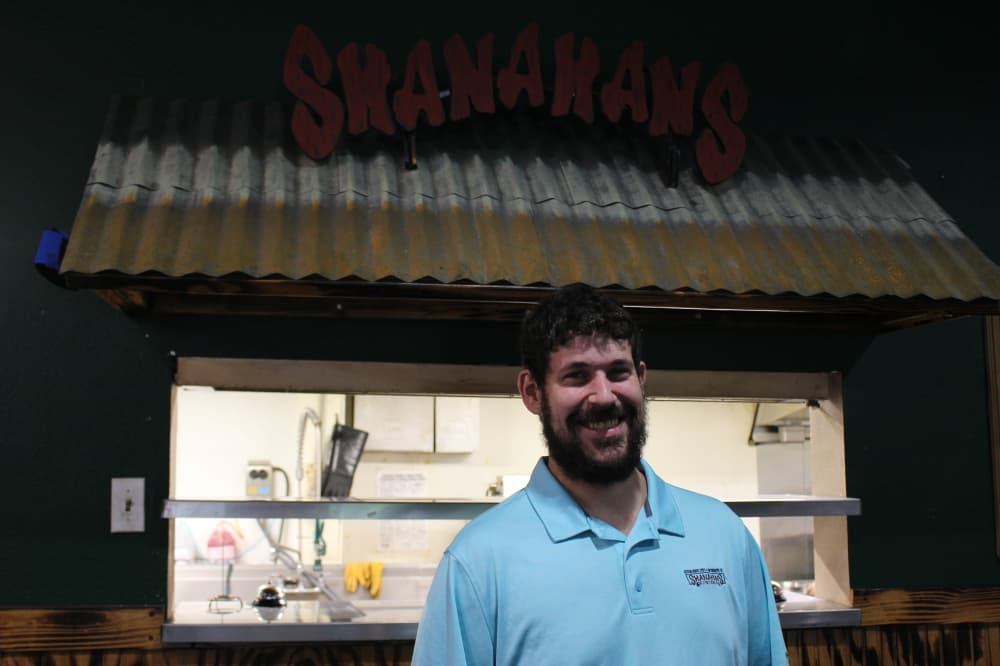 Gregory Wimer, owner of Shanahan’s Local Bar and Eatery in Montgomery, was 14 years old when his father decided to open the restaurant—then named Shanahan’s Bar and Grill—in 2002. (Peyton MacKenzie/Community Impact Newspaper)
