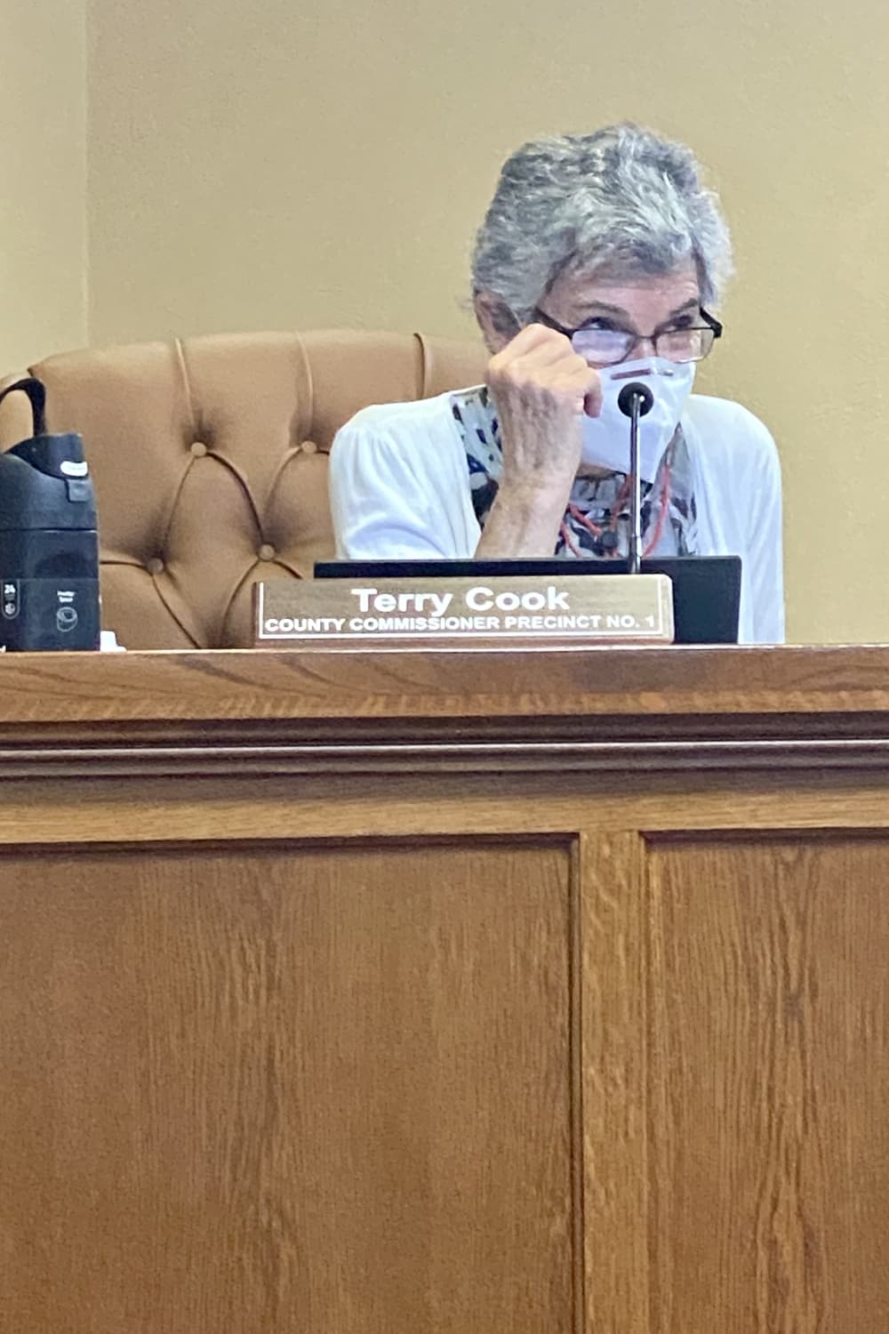 woman behind the dais