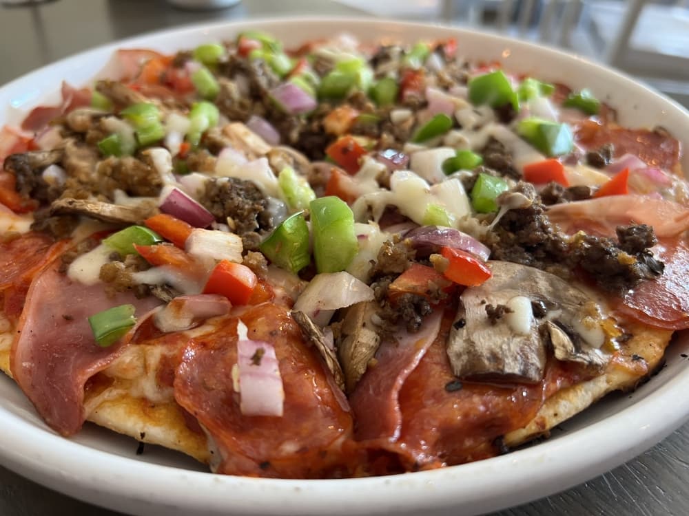 pizza with meat and veggies