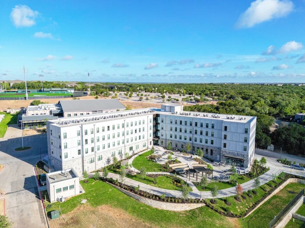 exterior shot of white residence hall
