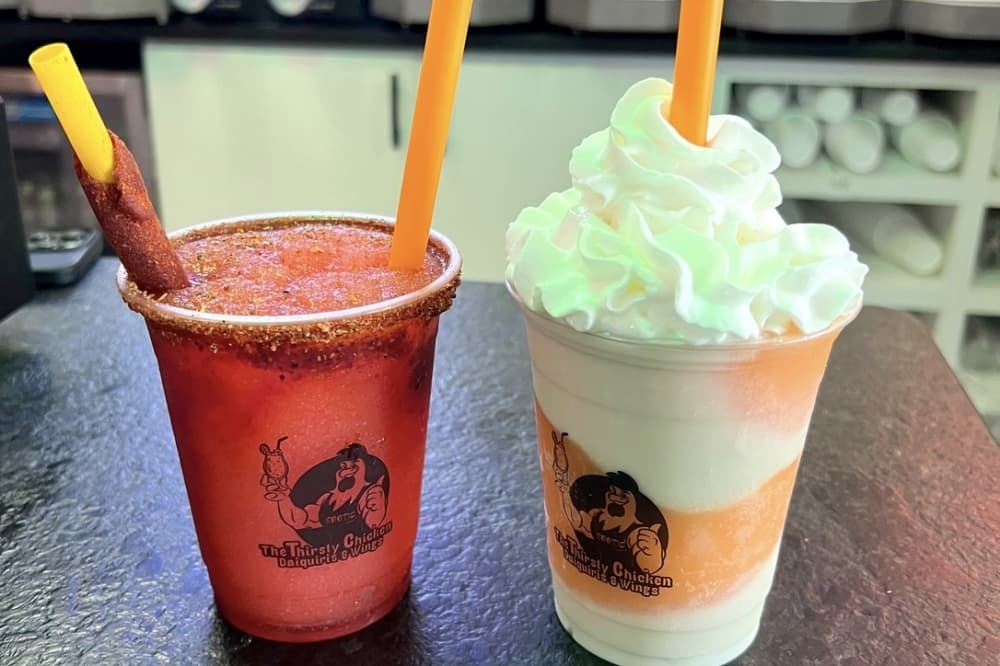 Popular daiquiris include The El Gallo Loco (left) and The Dodo Bird (right). (Zacharia Washington/Community Impact Newspaper) 