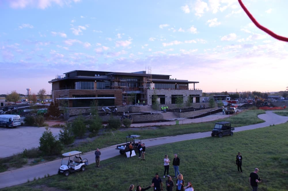 The Omni PGA Frisco Resort Clubhouse is under construction, as viewed from the air balloon. (Colby Farr/Community Impact Newspaper)