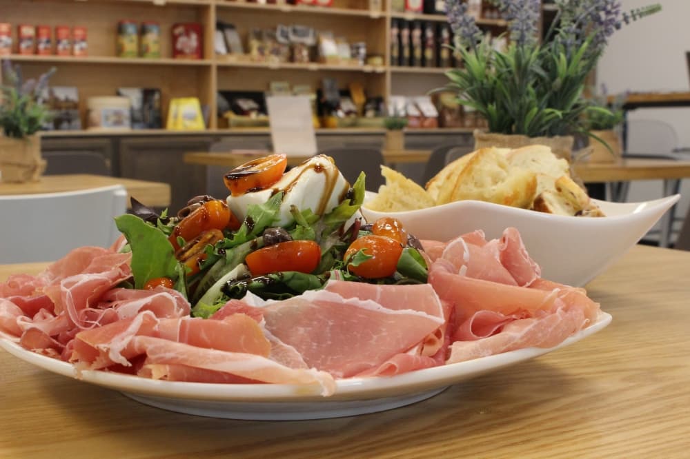 
The Tosca Salad ($14) consists of spring mix, burrata cheese, olives and prosciutto with other ingredients.