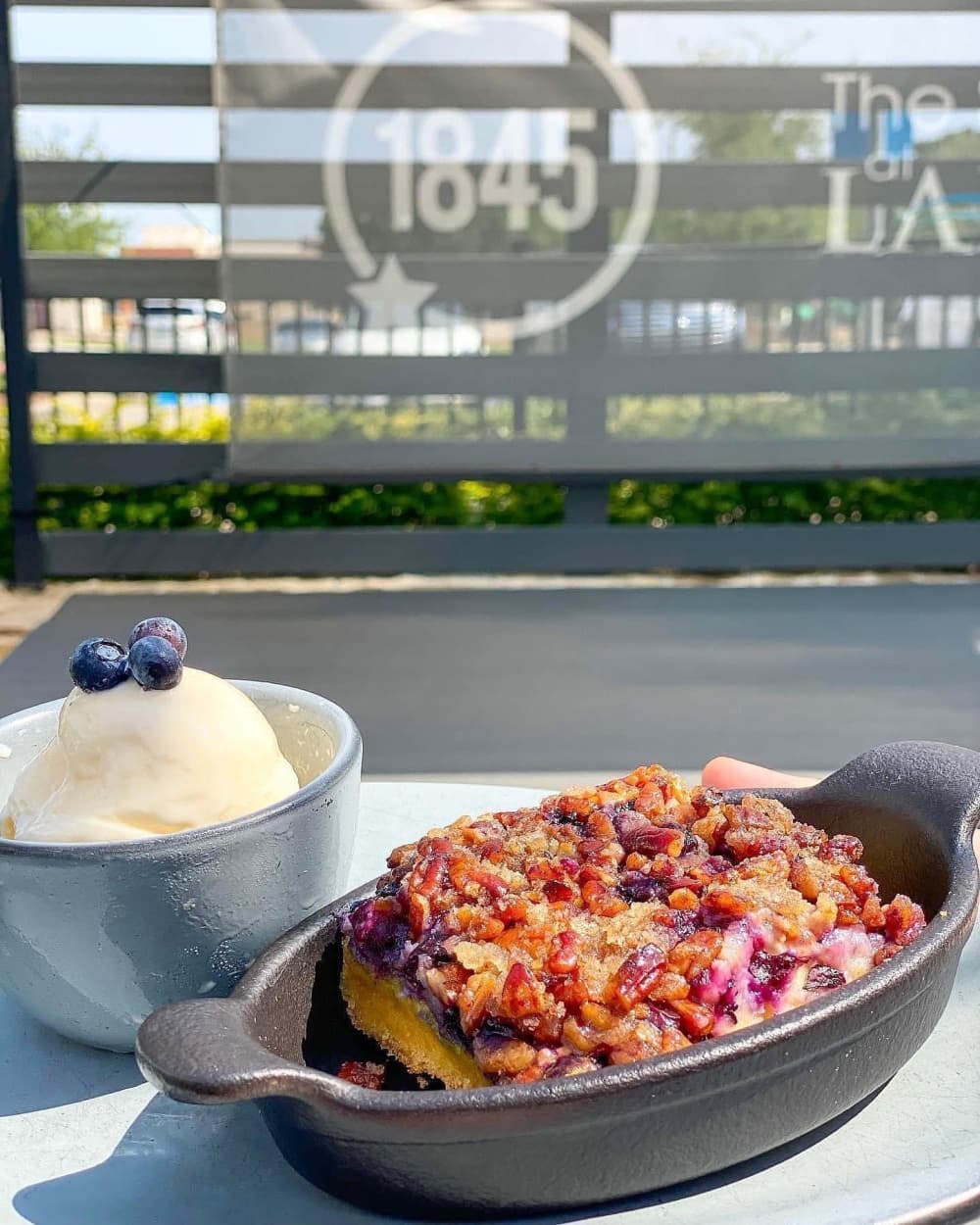 
The blueberry crumble is served with a scoop of vanilla Blue Bell Ice Cream.