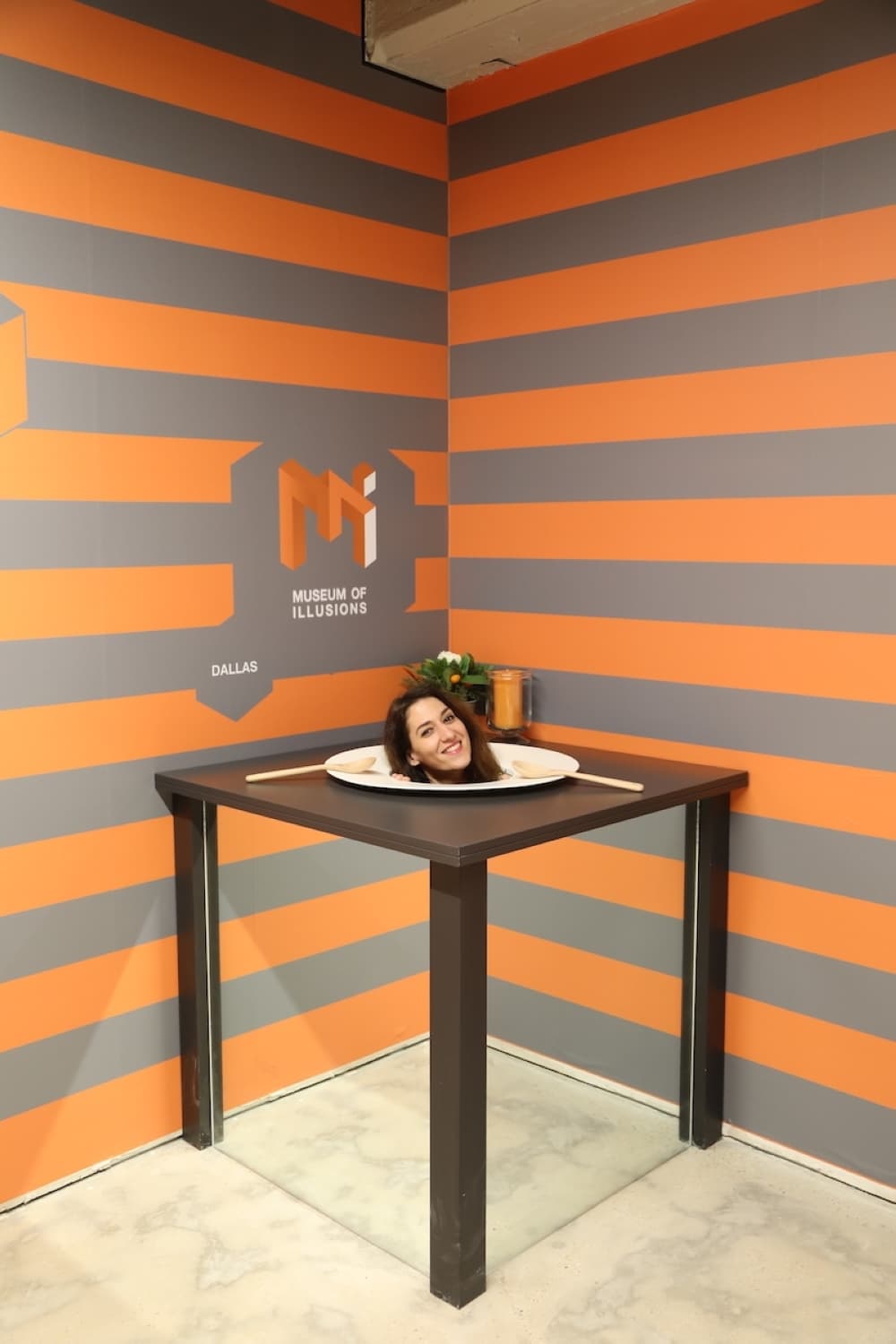 Table with a head on a plate
