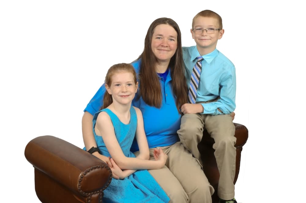 Laura Manning with her two children, Emily (left) and Aidan (right).