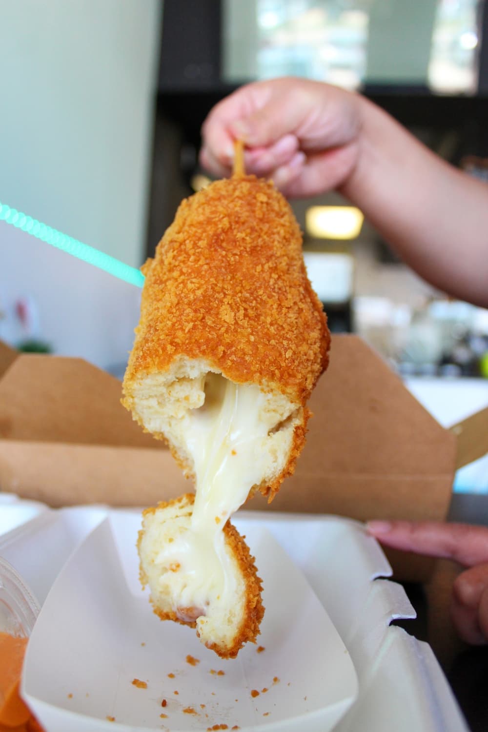Mozzarella dog ($4.60): Gooey  cheese is the star of this fried snack. (Emily Lincke/Community Impact Newspaper)