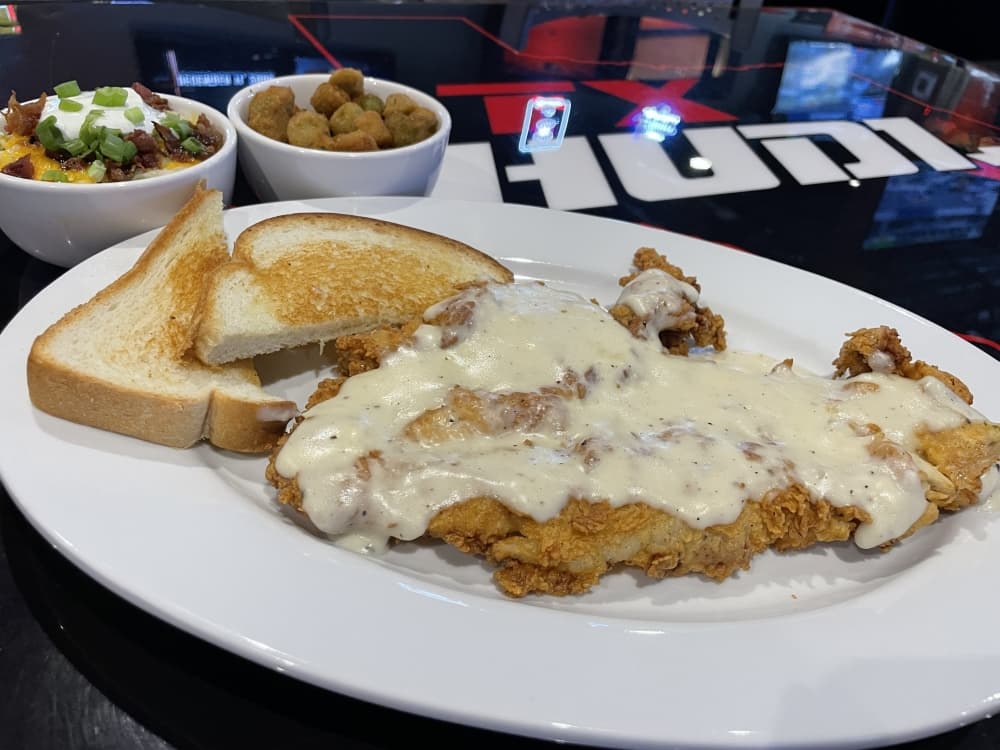 Chicken Fried Chicken ($14.49) is served with a choice of brown or cream gravy, two side items and Texas Toast.