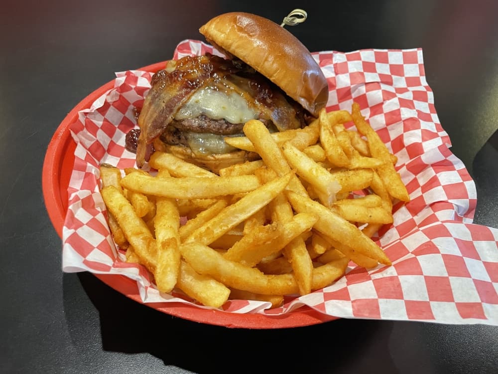 PB&J Bacon Burger ($12.29-$14.79) are all-beef patties covered with pepper jack cheese, bacon, peanut butter, and a choice of grape or strawberry jelly.