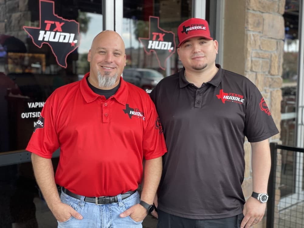 Dallas Lott (left) and Jonathan Wilbanks opened Texas Huddle Grille and Sports Bar in January 2021.
