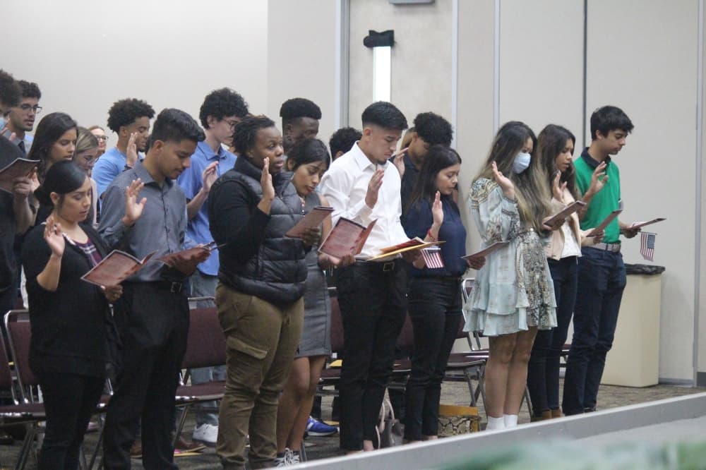 Candidates for U.S. citizenship take an oath of allegiance to the U.S., renouncing their prior country of citizenship. (Anna Lotz/Community Impact Newspaper)