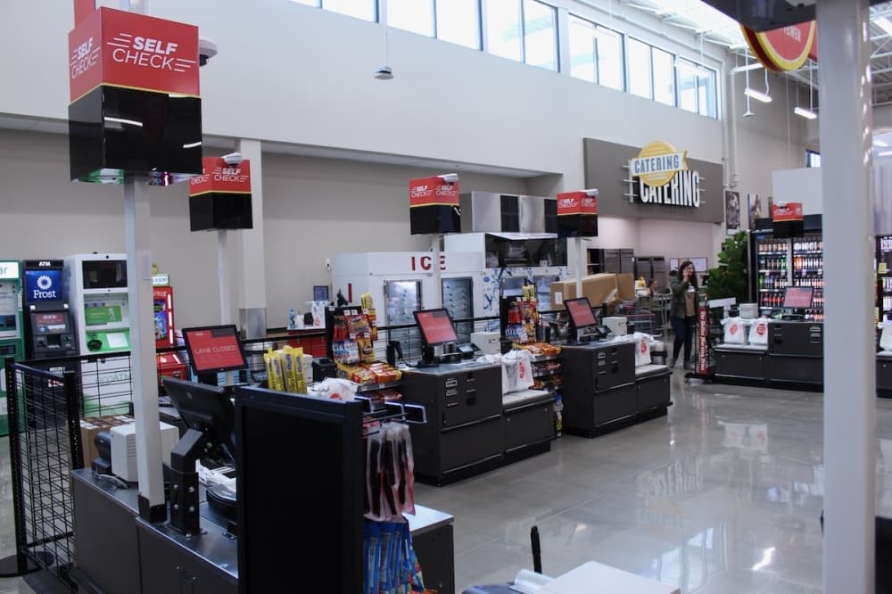 Ten self-check lanes can be found at H-E-B in Frisco. (Colby Farr/Community Impact Newspaper)