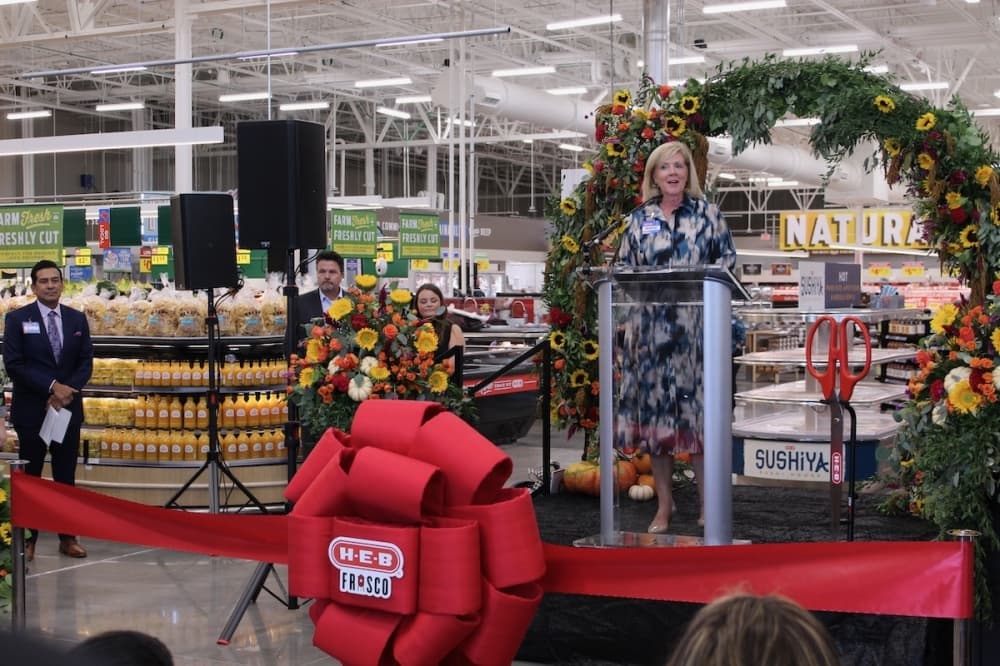 Senior Director of Public Affairs Mabrie Jackson opens the ribbon-cutting ceremony for the new H-E-B in Frisco on Sept. 20. (Colby Farr/Community Impact Newspaper)