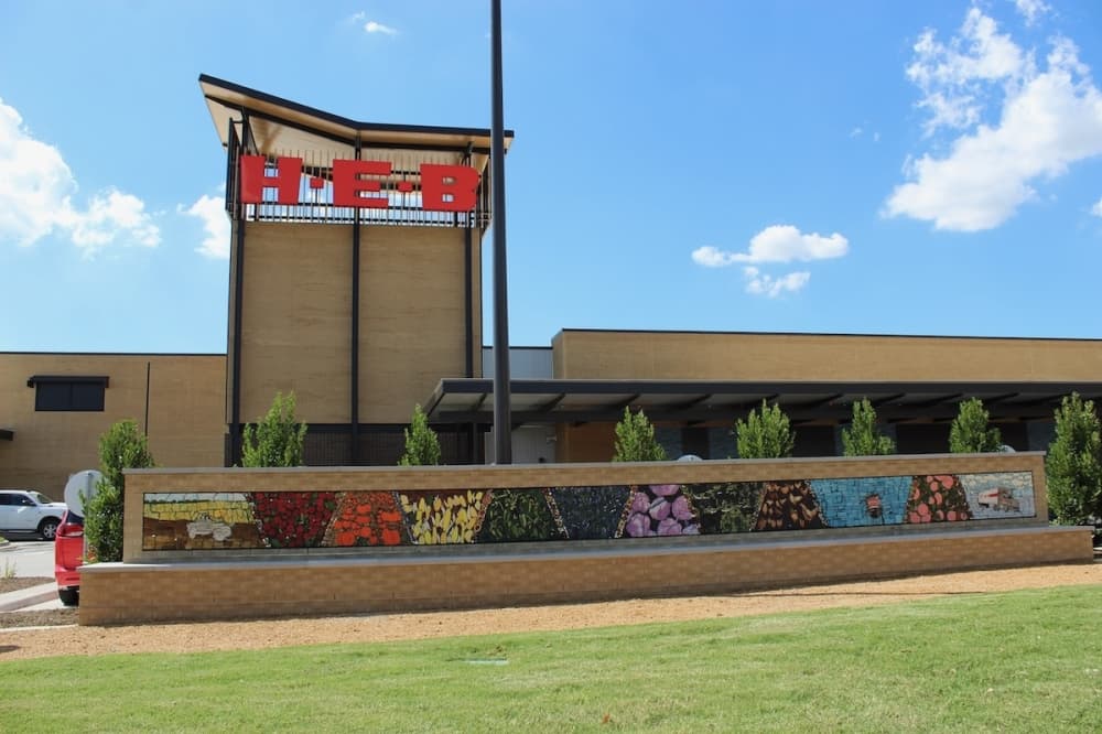 The east side of the store features a community art installation. (Colby Farr/Community Impact Newspaper)