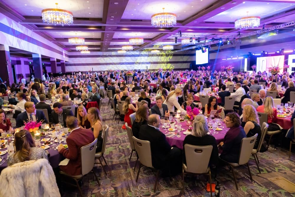 group of people at tables at event 