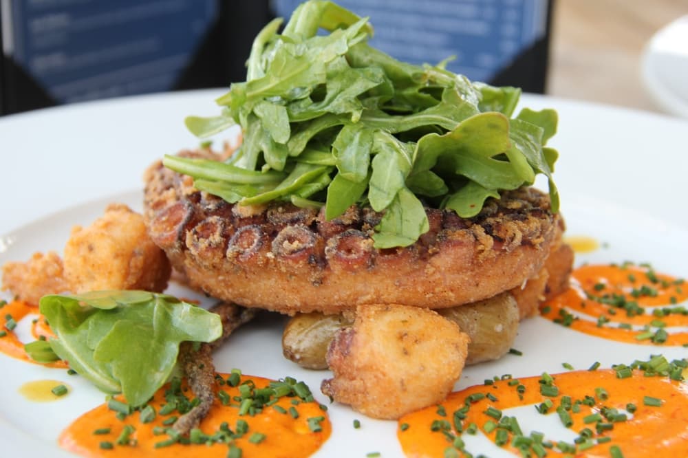 Octopus ($18): Octopus is served with Yukon potatoes, spicy tangerine citronette and chives. (Wesley Gardner/Community Impact)