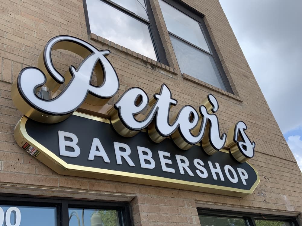 Peter's Barbershop offering haircut, shaving services off of Jupiter Road in Richardson