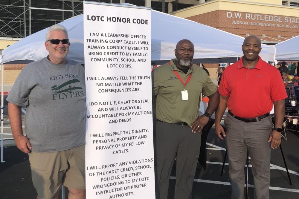 Judson ISD LOTC instructors stand with the LOTC honor code. (Judson ISD)