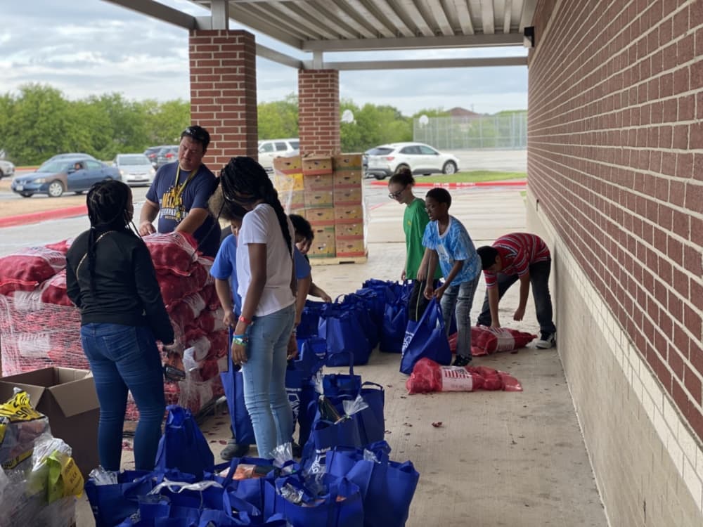 LOTC students contribute to food drive. (Judson ISD)