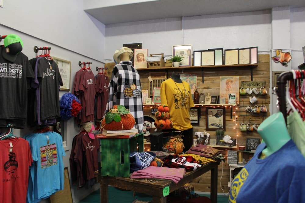 There are 27 vendors in the store selling different items such as mugs and shirts. (Peyton MacKenzie/Community Impact Newspaper)