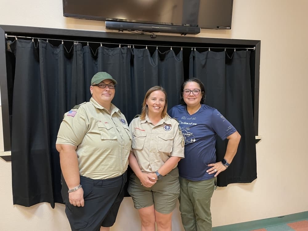 From left: Assistant Scoutmaster Amanda Werry, Scoutmaster Teresa Hutmacher and Committee Chair Nikki DeLeon help lead and guide the girls in Troop 4050. (Taylor Cripe/Community Impact Newspaper)