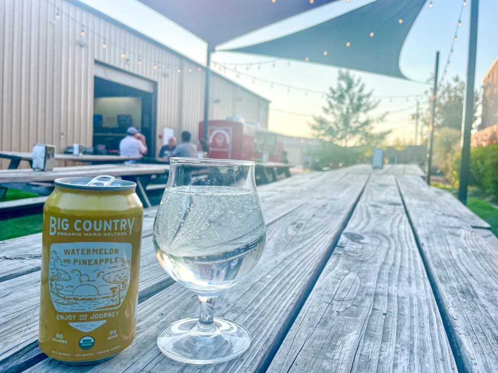 hard seltzer on picnic table