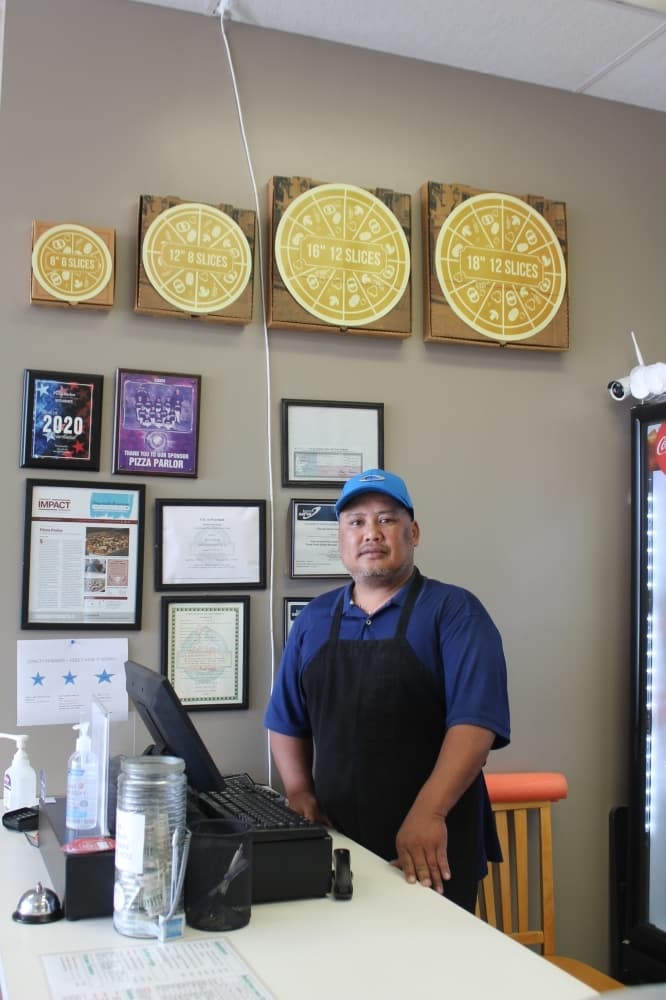 Owner and manager Kenneth Flores has worked in the pizza industry for 30 years. (Renee Farmer/Community Impact)