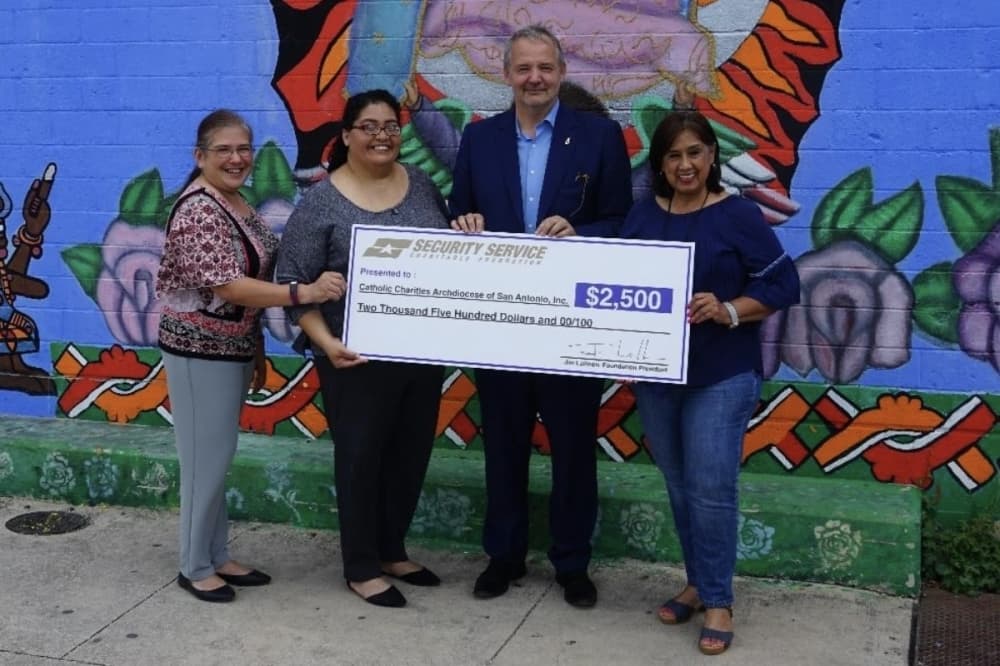 San Antonio financial institution’s nonprofit arm donates $2,500 to Catholic Charities