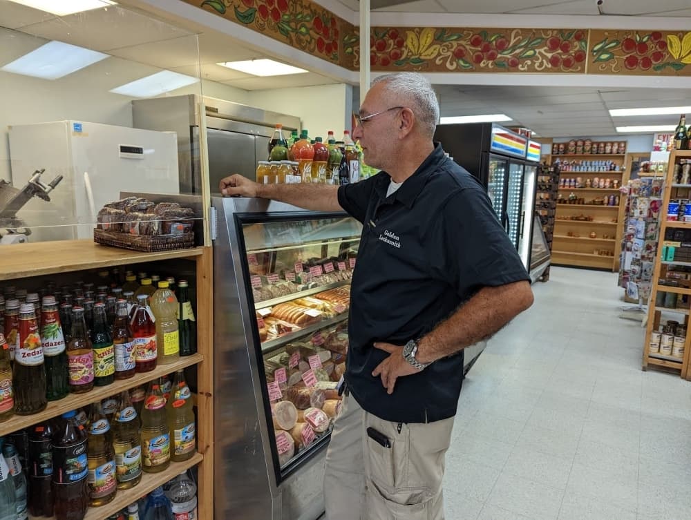 
Ori Levy, a regular at the store, shops for some of the store’s many kosher options.