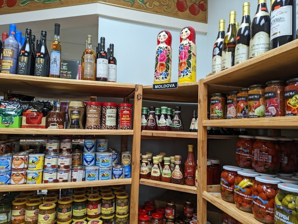 A section of the store is dedicated to products from Moldova, including wines, coffee, canned goods, dressings and sauces. 