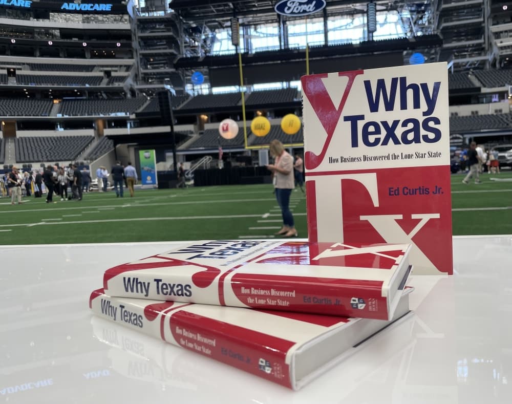 Photo of YTexas CEO Ed Curtis' book, "Why Texas," in AT&T Stadium. (Summer El-Shahawy/Community Impact)